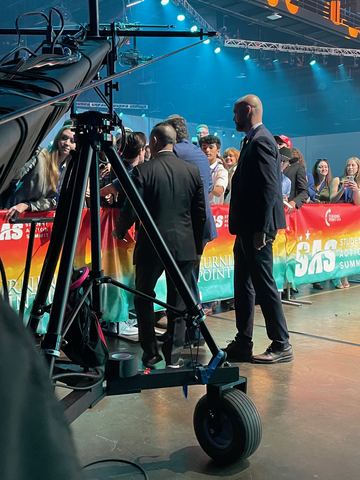 Tampa, Florida, July 2021 — camera rig and crew on the stage floor.