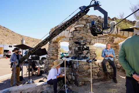 Qava TV (2025) — TechnoCrane — extended over a stone archway on an outdoor set.