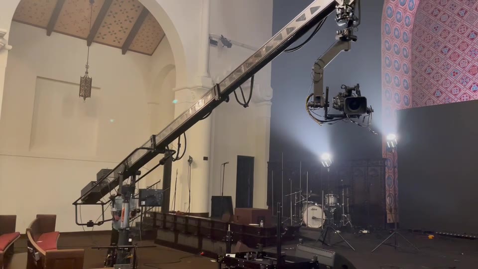 Jeff May Music Video (2021) — Jib. The arm across the vaulted room, the kit and stage below it.